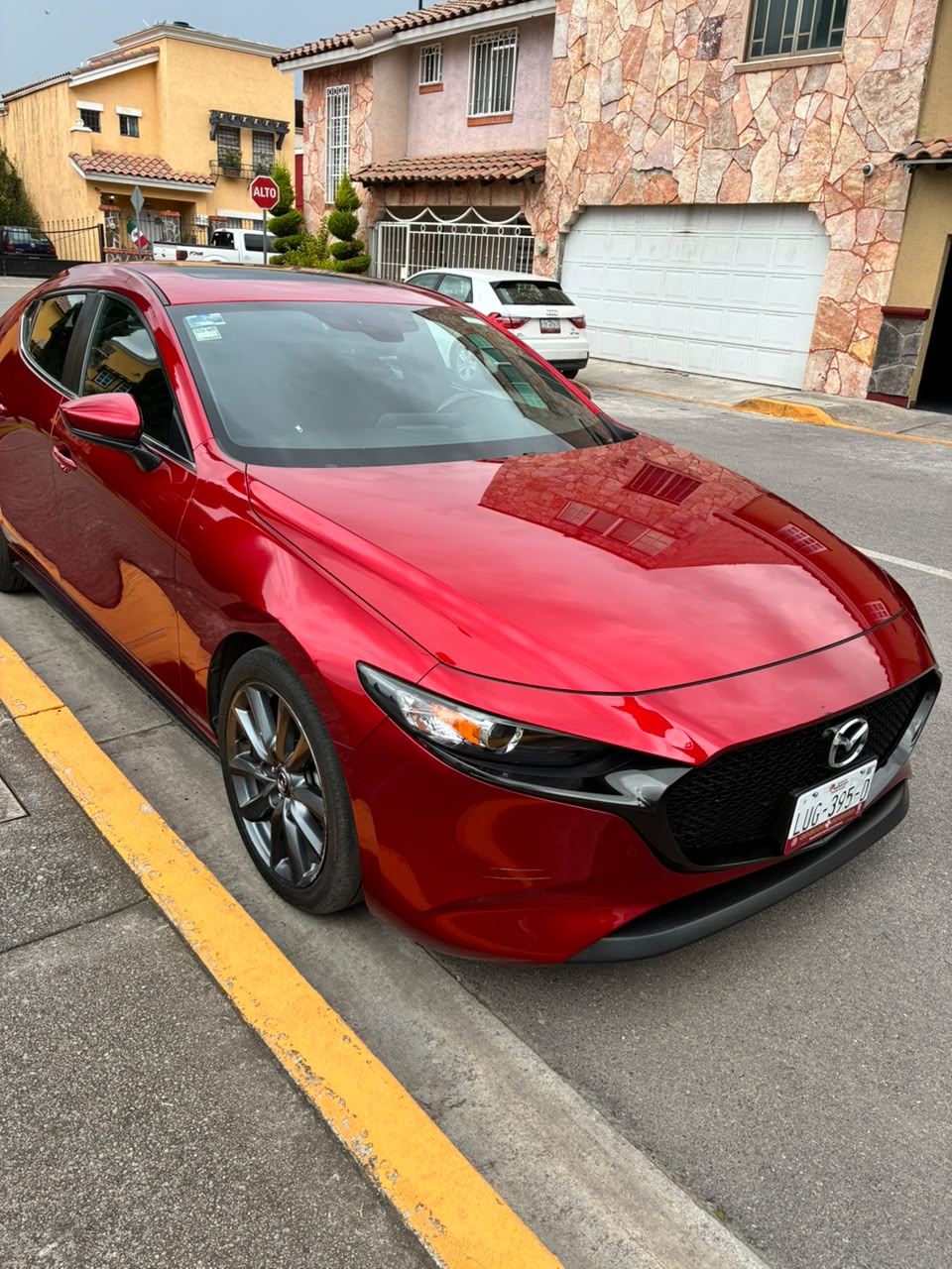 Mazda 3 rojo - trabajo RPF Studio